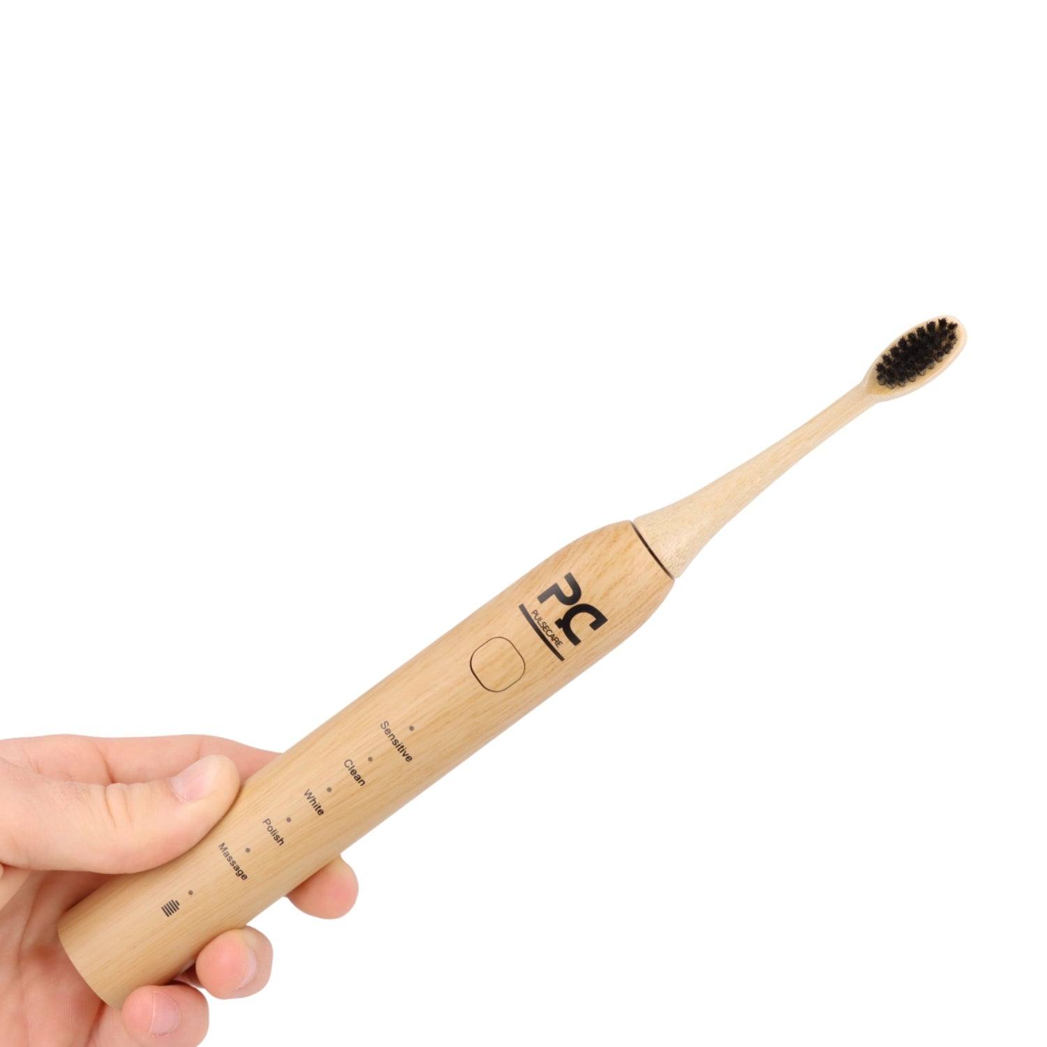 brosse à dents électrique écologique Pulse Care en bambou utilisée à la main